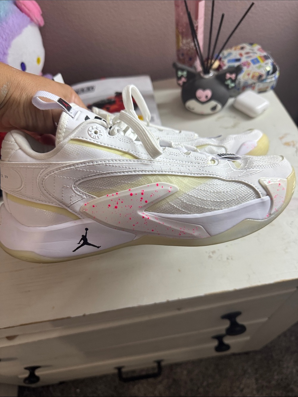 Jordan Women’s White Sneakers with Pink Speckle Accents
